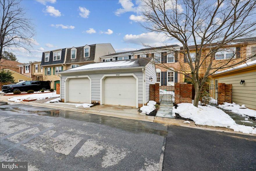 Owned and meticulously upgraded by long time owner, this beautiful three-level townhome features four bedrooms, two full baths, and two half baths with a detached garage.  Recent improvements include 5 year old roof, 6 year old HVAC, 4 year old hot water heater, recessed lighting added to main and upper level of home and upgraded kitchen appliance.   The entry level welcomes you to an open foyer with an expansive living room boasting hardwood floors and recessed lighting, flowing into a formal dining room with crown and chair molding and a gourmet eat-in kitchen finished with granite countertops and newer stainless steel appliances.  Upstairs, you'll find hardwood floors throughout the hallway and bedrooms, including a spacious owner's suite with recessed lighting, double closets including a walk-in closet and private bath. The lower level adds versatility with a fourth bedroom, half bath (including a rough-in for shower), and a large recreation room that opens to the rear patio and fenced yard backing to open space!   Complete with a detached garage, this home perfectly blends pride of ownership with modern convenience.