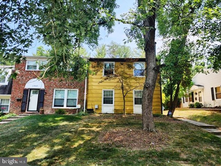 Spacious 2-level end unit townhouse with 3 bedrooms, 2.1 bathrooms, separate living room with a wood fireplace, dining room with slider to the fenced back yard with pavers, band new carpet, and kitchen vinyl floor. SOLD AS-IS.