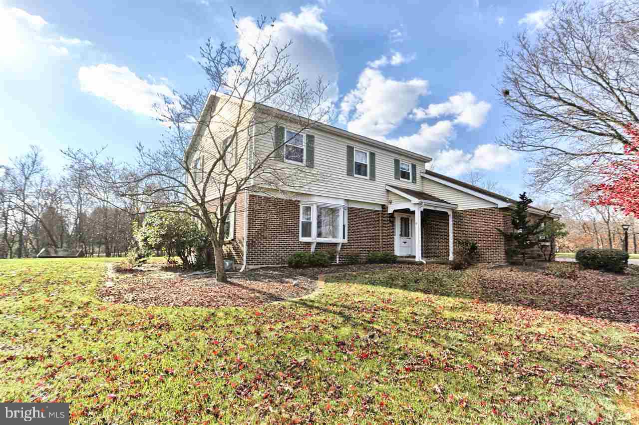 2 story home on private cul-de-sac in Lower Dauphin. Spectacular 1.1 acre lot bordering wooded area. Spacious 4 BR, 2.5 BA. First floor features sun filled eat-in kitchen with island, generous sized LR, DR, FR with wood burning FP and gas logs, and glass and brick enclosed sun room with built in grill. Newer roof, kitchen, windows, heat pump. Easy access to Hershey and Harrisburg.