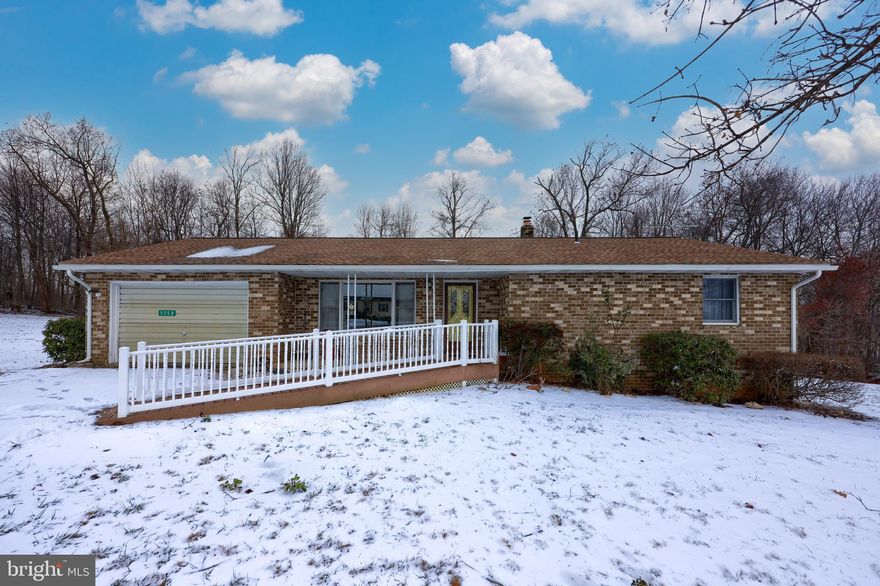 This cute, cozy rancher is situated on a large lot in a rural setting, but is still convenient to restaurants and shopping. Enjoy the lovely view from the recently added back porch. Two main level bedrooms and baths, main level laundry along with front ramp make this home very attractive to those looking to get away from stairs. Lower level has tons of storage as well as a den and third bedroom.  Some updates include newer roof, spouting, gutters, paint, hot water heater and kitchen countertops. Great location for Maryland commuters. March settlement preferred.
