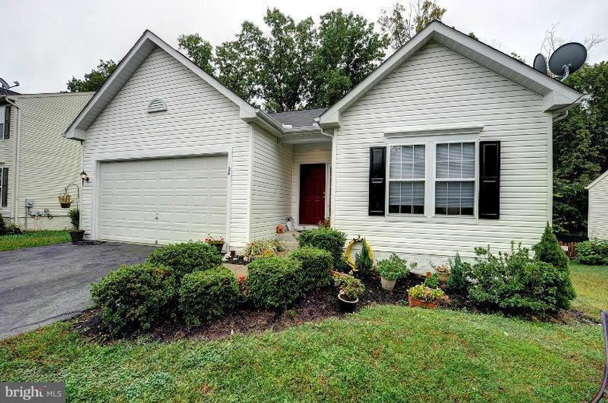 SURPRISINGLY SPACIOUS RAMBLER IN POPULAR STAFFORD LAKES...ONE LEVEL LIVING, GREAT ROOM WITH GAS FIREPLACE  & SKYLIGHTS, CHARMING KITCHEN WITH GRANITE COUNTER TOPS....2 CAR GARAGE... PRIVATE DECK AND WOODED LOT....BASEMENT HAS PRIVATE ENTRANCE WITH 2 LARGE BEDROOMS AND KITCHEN ... PERFECT IN LAW SUITE....