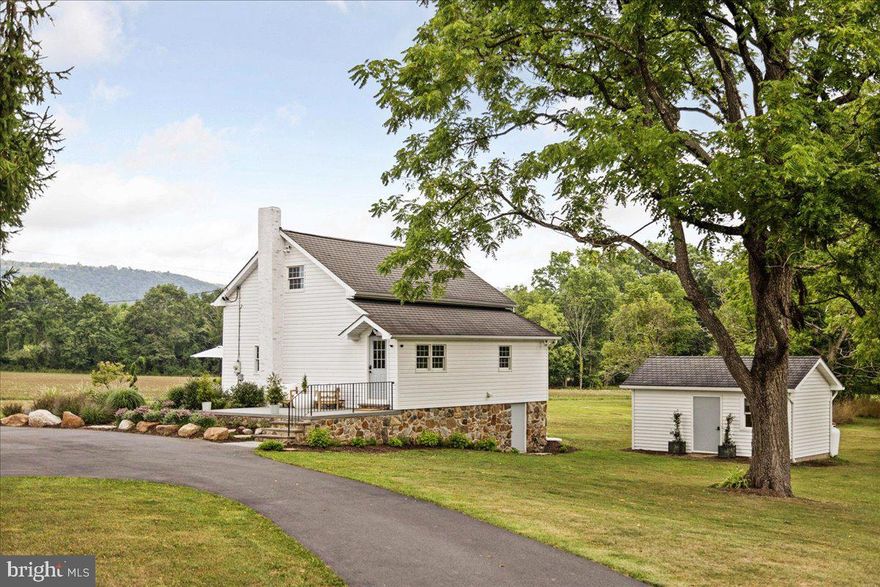 Located in rural Bushkill Township in the Lehigh Valley metropolitan area, the fastest growing metro in PA, Bay and Bramble Farm is a small country compound on over 85 acres with open farmland and wooded perimeters, bounded on the north by the Blue Mountain, home to the Appalachian Trail. The long-distance views are exceptional. The adorable c.1800 cottage-style log home is accompanied by a detached office, 19th century bank barn, equipment shed and milk house. The property provides the opportunity to lead a charmed country lifestyle, as well as offering long-term investment potential. Though in Act 319 currently, developers will be attracted to the 1-acre minimum zoning, perhaps for an upscale country subdivision. The equestrian will recognize the potential to create a large-scale horse farm with stables, paddocks, riding trails through the woods, and arenas, in close proximity to NE horse shows; the existing house would be ideal for housing a resident trainer. Perfect as a weekend oasis, or create a family compound, siting a substantial main house further back on the land to take advantage of the phenomenal views of mountains and wildlife. Bushkill Township has offered to conserve the land which could be the tidy sum needed to make the property right for you! Desired Nazareth Area School District. Arrive in Philadelphia or NYC in under 2 hours. Come for a weekend, stay for a lifetime!
