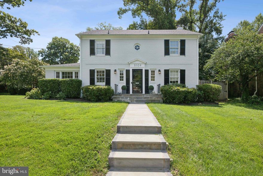 This beautifully renovated and meticulously maintained 5-bedroom, 2 full bath, 2 half bath Colonial across three levels, offering designer finishes and exceptional livability. At its heart is a chef’s dream kitchen with a farmhouse sink, glass-front cabinets, massive stone island with seating for five, gas range with hood, wall oven, wine fridge, built-in refrigerator with appliance garage, and abundant storage. The main level also boasts a bright formal dining room, elegant living room with fireplace and built-ins, custom wallpapered powder room, bonus den/office/bedroom, and a well-appointed mudroom with cubbies, hooks, and shelves. Upstairs, the spacious primary suite is joined by three additional bedrooms and two recently renovated baths, while the walk-out lower level offers a large rec room, flex space easily converted to a sixth bedroom, and a half bath with potential for a full. With a flat yard and patio, built in custom grill, quick city access, and located in a coveted school cluster, this home truly has it all.