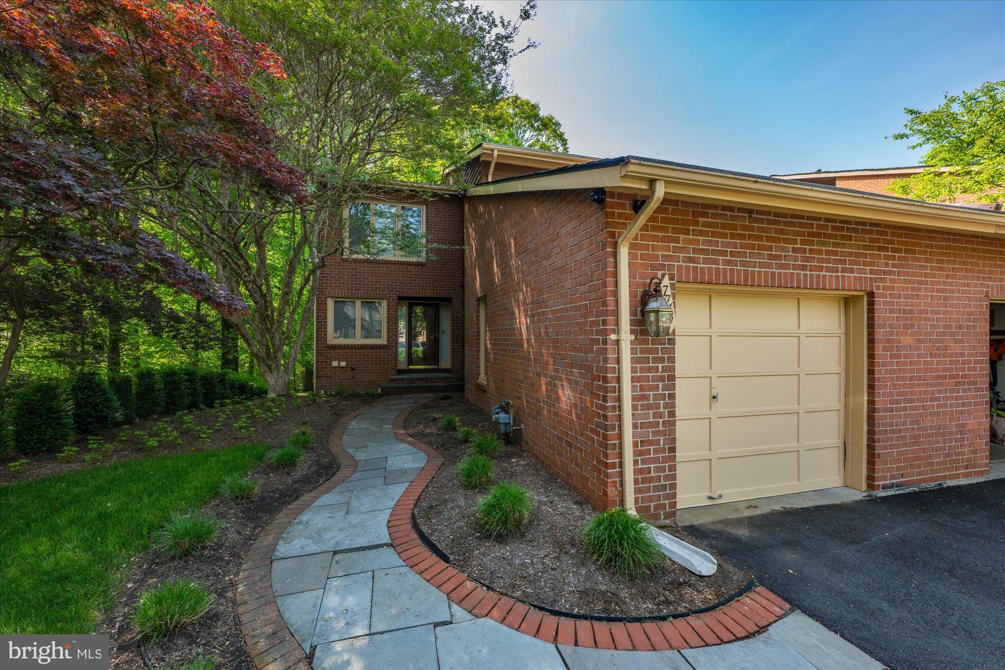 Welcome to 7714 Whiterim, Terrace, a fantastic end-row unit home ideally situated in the sought after Woodrock neighborhood of Potomac, Maryland, zoned for Carderock Springs Elementary School, Thomas W. Pyle Middle School, and Walt Whitman High School. Featuring three bedrooms and three and a half bathrooms, this exceptional floorplan is rarely available in this community.
Step through the front door and be welcomed by an abundance of natural light streaming through oversized windows, highlighting the gleaming hardwood floors throughout. The open-concept living and dining area offers the ideal layout for modern living, with large windows and doors along the back of the home that create a seamless connection to the outdoors. Enjoy the added privacy and serene views from the expansive deck, a unique perk of this coveted end-unit location. A wood-burning fireplace serves as a warm and inviting focal point in the living room, while the spacious dining area is perfect for both entertaining and everyday enjoyment. The kitchen is both functional and stylish, featuring ample cabinetry for all your storage needs, stainless steel appliances, and convenient countertop seating. A bonus built-in offers additional space for displaying your favorite items. With direct access to the garage, unloading groceries is effortless and efficient. A powder room and hall closet complete this main level.Â
Follow the spiral staircase to the upper level, where you will find three bedrooms and two full bathrooms. The primary suite serves as a true retreat, featuring wooded views, a vaulted ceiling, dual walk-in closets, and a bathroom with an oversized shower and dual vanities. The two additional bedrooms share a well-appointed hall bathroom, complete with a combined shower and tub. The lower level of this home offers a surprisingly spacious layout, featuring a large recreation room centered around a cozy wood-burning fireplace and direct walk-out access to the fenced rear patio. A generously sized bonus room provides the perfect space for a home office, GUEST ROOM or gym, and sits adjacent to a full bathroom with a shower and tub. A dedicated laundry room completes this level, adding to the home’s overall functionality.Â
Woodrock is a wonderful community ideally located in Potomac, Maryland—just minutes from Potomac Village, I-495, the Clara Barton Parkway, and Great Falls National Park. Enjoy easy access to endless hiking and scenic trails while benefiting from a truly central location. With so much to offer, this exceptional home won’t be available for long—don’t miss the opportunity to make this yours today.
