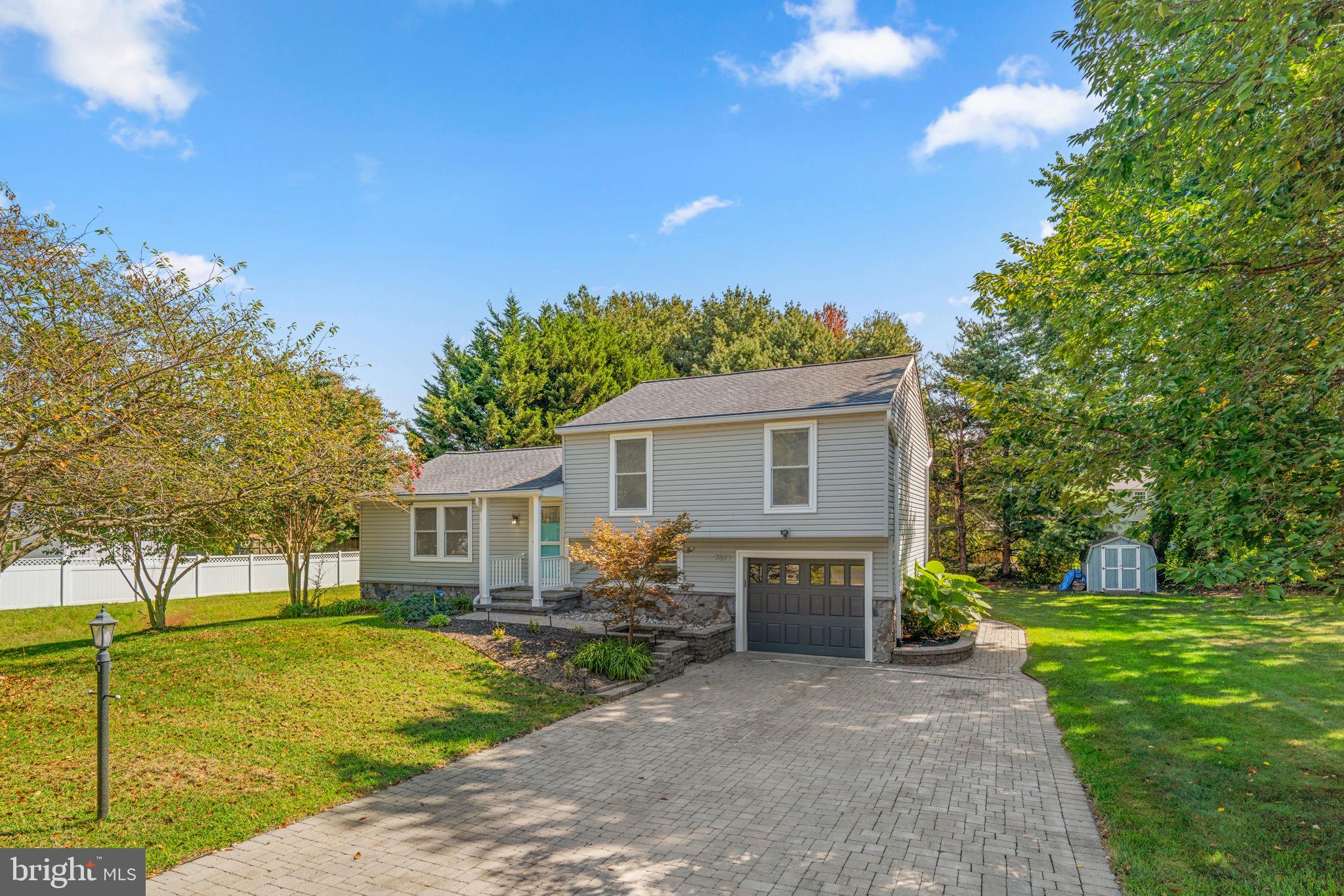 Welcome to your future home at 7871 Chestnut Leaf Road in Severn, MD! This move-in ready gem offers a perfect blend of comfort and modern conveniences. Spread out over 2100+ square feet across 4 levels, this delightful home has 3 bedrooms and 2.5 bathrooms. The open-concept living area is great for entertaning.
The kitchen has Silestone countertops, a stylish wine bar with a fridge. Enjoy meals in the dining room or on the Trex deck and paver patio overlooking your expansive private backyard—ideal for outdoor gatherings.
Additional highlights include a California closet system, a finished basement with laundry and a 1-car garage equipped with an electric car charger hook-up. Plus, the paver driveway provides ample parking for guests.
With a newer water heater, this home has all the necessities covered.