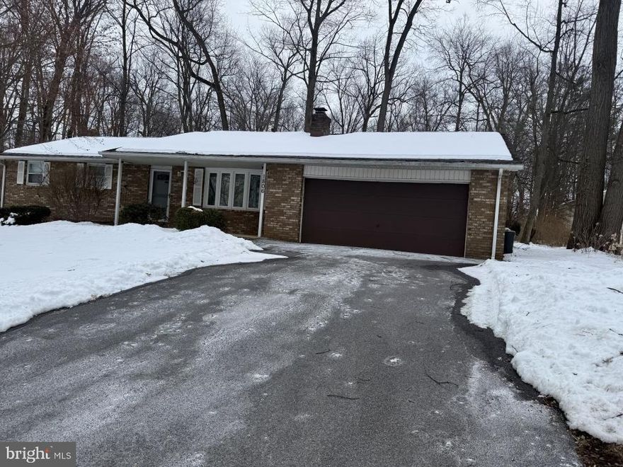 Upcoming Auction May 5th 2026 at 5pm. Ranch style home with 3 bedrooms, 2 1/2 baths along with a large kitchen, a living Room with a Wood Burning Fireplace, heated Sun room off the rear of the home with plenty of windows overlooking Mature Trees and Woods, Finished Basement with Bar Area/ Tap System and a 2nd Fireplace. All of this plus an attached two car garage on 0.61 acres.