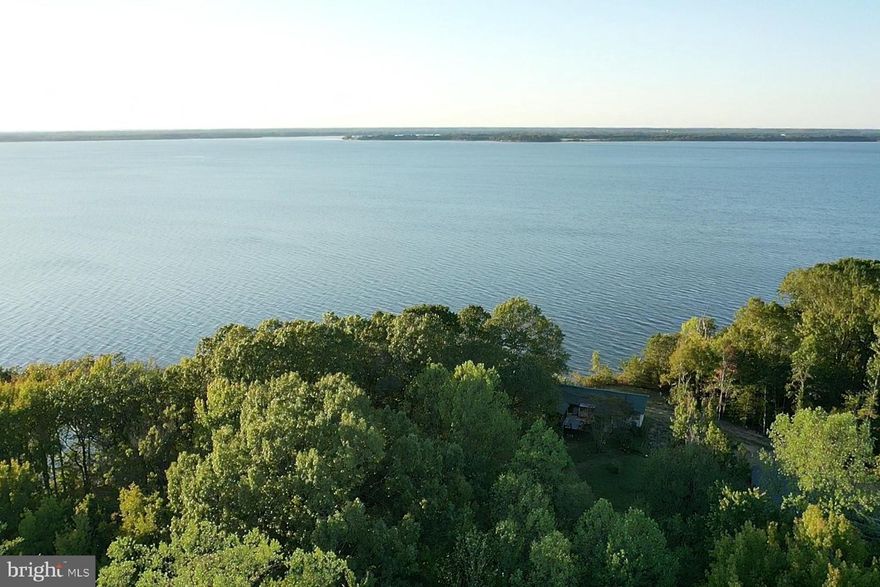 Discover the perfect blend of natural beauty and convenience with this stunning wooded waterfront lot overlooking the Potomac River. Enjoy expansive views, serene surroundings, and direct access to nature—all just minutes from shopping, dining, and Dahlgren. Whether you're planning your dream home or a peaceful retreat, this location offers the ideal canvas.