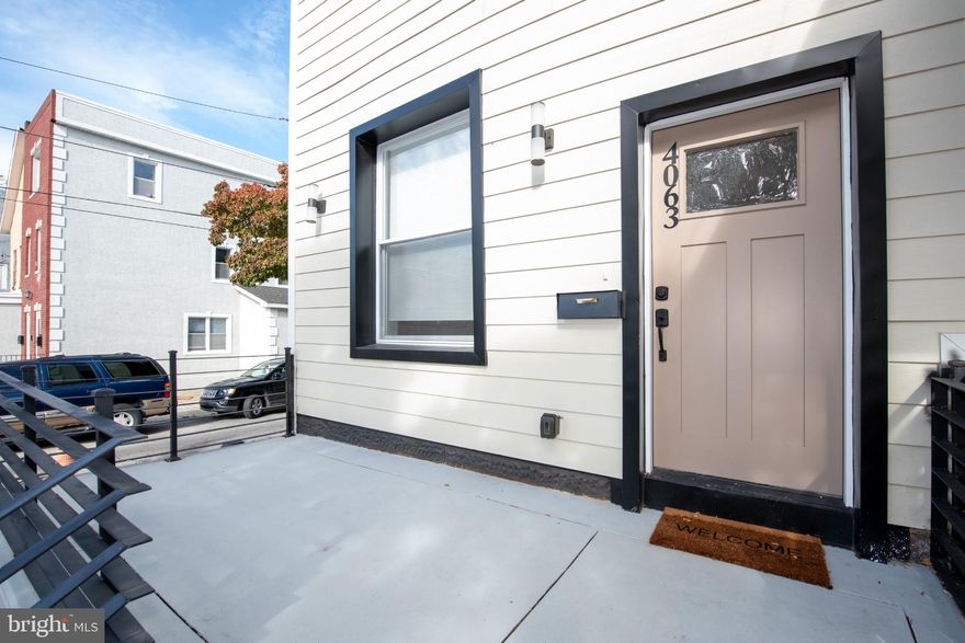 This charming end-of-row townhouse in the heart of Powelton Village offers a perfect blend of comfort and community. Built in 1915, and tastefully renovated this home boasts 5 spacious bedrooms and 3 full bathrooms, providing ample space for relaxation and gatherings. The interior features a large, first floor level with new kitchen with contemporary island, and outside access.  The full basement offers potential for additional storage or creative use. Nestled in a vibrant neighborhood, residents enjoy easy access to local parks, perfect for leisurely strolls or weekend picnics. With a detached garage for secure parking and a well-maintained exterior, this property is both functional and inviting. Experience the warmth of Powelton Village, don't miss the opportunity to make this delightful residence your own!  You have to see this property to appreciate all that it has to offer.