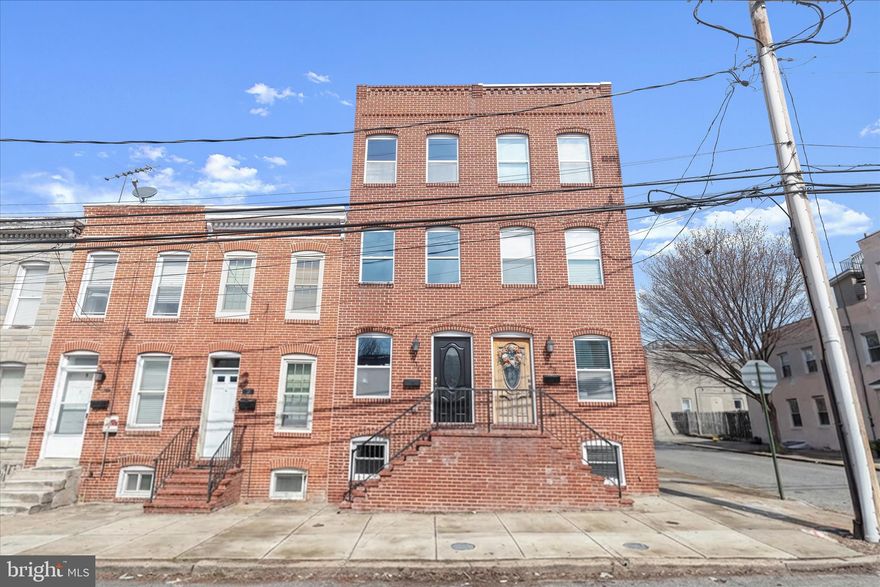 Welcome to this fully renovated four level rowhome in Federal Hill offering three bedrooms and three and a half bathrooms. Step inside to discover the open concept main level that boasts rich hardwood floors and an exposed brick wall. A freshly painted neutral color theme complemented by tall ceilings and recessed lighting continues throughout the home. The front living room provides a cozy spot to gather, with a separate dining space for enjoying meals. The kitchen is equipped with stainless steel appliances, granite countertops, a backsplash, 42-inch cabinets and a door outside to the enclosed patio. Upstairs, the second level includes a bedroom with a private ensuite bathroom that has a tub shower. Also located on this level is another bedroom with a walk-in closet, and a full bathroom in the hall with a walk–in shower. The top floor is dedicated to the primary suite with a sitting room that has French doors that open to the rooftop terrace, perfect for relaxing or entertaining. The primary bedroom features a walk-in closet while the ensuite bathroom has a walk-in shower. The finished lower level expands the living space with a versatile recreation room and a half bathroom. Recent updates include new paint throughout, upgraded bathrooms and more. Located in one of Baltimore’s most sought-after neighborhoods, this home is just two blocks from Riverside Park and all Federal Hill, Riverside and Locust Point have to offer with top-rated restaurants, lively bars, boutique shops, entertainment, and everyday essentials just around the corner. Quick access to downtown, the Inner Harbor, major highways, and public transit ensures effortless commuting. A perfect blend of charm, modern updates, and incredible city living awaits!