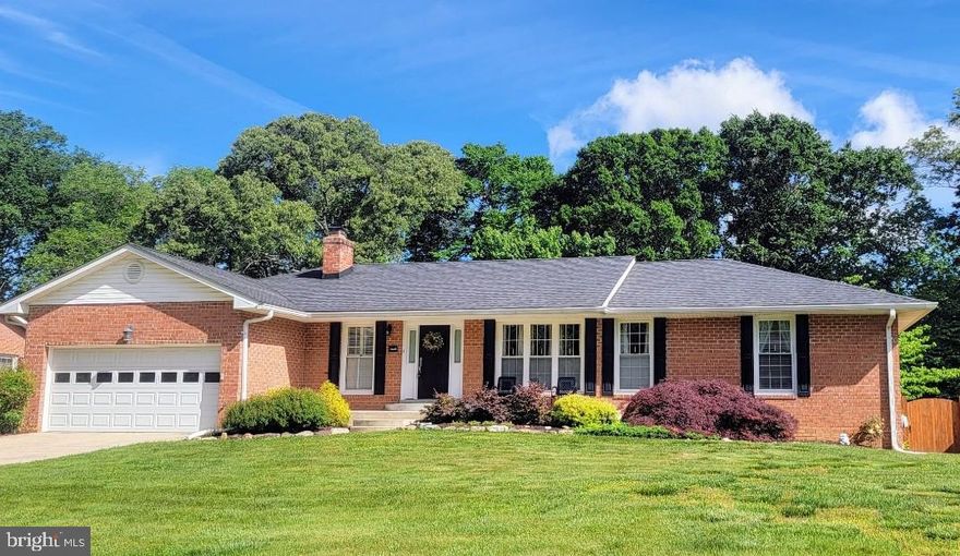 ABSOLUTELY GORGEOUS  WATERFRONT HOME ON THE LAKE WITH PRIVATE DOCK ** ALL BRICK RAMBLER WITH FINISHED BASEMENT!  Community Access to the Patuxent River, Gated Private Road, Exclusive Community Access to Pier & Boat Ramp where you can go Boating, Canoeing, Kayaking  & has a Pavilion, Playground, Outdoor Grills. Community, Two Ponds, one with a Fishing Pier* Lots of Fun Things to Do!  This home has been Totally Updated over many years and Shows Like a Model!!!  Nice Front Porch & is Nicely Landscaped * Mostly Hardwood throughout the Main Level * Entrance Foyer has a Custom Ceiling & Coat Closet * Very Spacious Living Room * Beautiful Kitchen has Duraceramic Tile Flooring, Corian Countertops, EIK Table Space,  Oak Cabinets,, White Appliances with French Door to Back Yard Covered Trex Deck & Brick Patio for your Enjoyment & Entertaining  * Separate Dining Room * Office/Den with Brick Fireplace * Primary Bedroom with Primary Bathroom & Walk-in-Closet  * Very nice Hall Bath * Linen Closets ** Lower Level Features a Good Size Rec Room w/Pool Table conveys for your Entertaining * Also has a 4th Bedroom w/LVT Flooring & Additional  Den w/LVT Flooring * There is a Huge Laundry Room w/Washer & Dryer, Wet Sink with a spacious Workshop Area * Beautiful Powder Room ** 2 Car Garage w/Concrete Driveway ** Walk-Out Basement * From your Back Yard you can walk a few steps down to your Private Dock on the Lake where you can fish and take your small boat out for your enjoyment  * Enjoy a Seasonal View of the Patuxent River from the Deck & Master Bedroom where you can capture a Beautiful Sunset** Partially Fenced in Back Yard *  Quite a few Blueberry Bushes in the back yard that produce lots of blueberries during the summer months ** Quite a few Community Get Togethers with planned activities * Some unique trees on the property - Native Magnolia, Native Dogwood, American Holly Tree, Butterfly Bush & Lots of Amazing Birds to see too!!!  This Home Shows Very Well &  is a Pleasure to Show!  Also, Great North Calvert Location!  Not far to Andrew's Air Force Base, Washington DC, Beltway,  Annapolis,  Chesapeake Bay, Chesapeake Beach Water Park, Shopping,  Restaurants,  Calvert Memorial Hospital, Dunkirk Park & so much more!