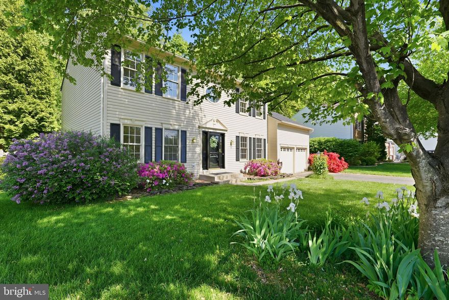 Welcome to 5106 Leatherback, a stunning retreat nestled in the highly desirable Lake Terrapin community of Woodbridge. This Khovnanian Kingston model home boasts over 4500 square feet of living space on 3 levels. Beautifully maintained, this home has 4 bedrooms, 2 full and 2 half baths. Step outside to a fully fenced backyard on the 1/3 acre lot with lush green space that is fully fenced and surrounded by mature trees and backing to woods ideal for entertaining, gardening, or relaxing. The backyard has a huge 20 X 28 composite deck and a brick patio with a wood pergola.  Irrigation systems for both the front and backyard. The sun-filled main level includes a spacious family room, with an updated gourmet kitchen with granite countertops, a large custom island, stainless steel appliances, and a built-in microwave. Host elegant dinners in the formal dining room or work from home in the main-level office. Upstairs, you’ll find four spacious bedrooms, including a luxurious primary suite with a walk-in closet and spa-inspired bath, complete with soaking tub and walk-in shower. The fully finished basement includes a  kitchen and a second fireplace with new luxury vinyl plank flooring, and a storage room with shelved storage closets. Recent updates include new carpet on the upper level, freshly painted throughout, new HVAC (2025), new roof & gutter guards (2024) , new water heater (2025), new windows on the back of the home, and new hardwood floods throughout the main level. .Community amenities include a pool, tennis and basketball courts, clubhouse, walking/biking trails, and a scenic lake. The low $100 a month HOA fees include snow removal, trash and community events. Just minutes to shopping, dining, VRE, commuter lots, and with easy access to Quantico, Fort Belvoir, the Pentagon, and Washington, D.C. Don’t miss your chance to own this exceptional home—schedule your showing today!