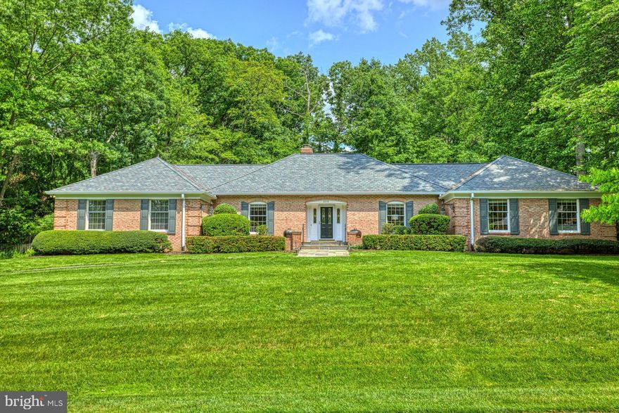 This sprawling sanctuary, in Vienna's wonderful Wendover,  features a sumptuous main level Primary Suite with a private deck tucked into the lushly landscaped back yard. Enjoy nearly 6000 square feet on two expansive levels.  It's sprawling.  It's incredibly special for its location and all of its amazing features. Newly refinished hardwood floors. Interior and Exterior painted. New carpet in lower level. New light fixtures.  Refreshed baths. Three Fireplaces. New Roof 2021. Fenced back yard with a special area for your furever friends. Such a flexible and well designed floor plan, you'll be able to spread out in style.  The impressive lower level bedroom suite and lounge/game areas are well defined and well appointed.  What you will also love are the other large rooms that can be exactly what you want them to be. Think music studio, movie room, exercise room.  And, there is a rough in for a kitchenette, too.  Imagine the possibilities.