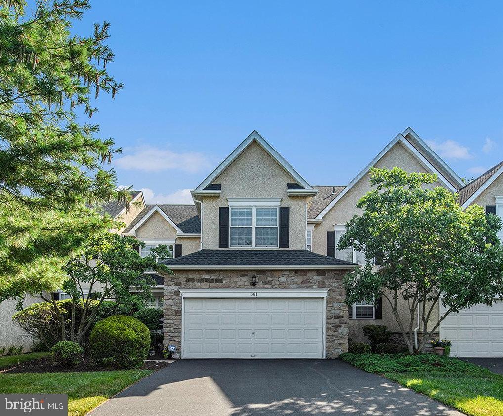 Incredible opportunity in the Wissahickon School District. This immaculately maintained and lovingly upgraded townhome located in the highly desirable Yorkshire of Blue Bell community is move-in ready with lovely upgrades. Notice the lovely landscaping creating a private entrance to this home with a quaint front porch leading into the foyer with a large coat closet, neutral paint and gleaming hardwood floors that extend throughout the entire main level. This home is designed for comfortable living and gracious entertaining. The living room is filled with natural light and is open to the formal dining room with an elegant tray ceiling and chandelier. Continue to the heart of the home past a convenient powder room with a pedestal sink into an amazing family room with soaring vaulted ceilings, ceiling fan and a wall of windows surrounding the gas fireplace with wood mantle, marble surround and hearth. Separated by a pony wall, the kitchen and breakfast nook are completely open to the family room, making it perfect for large gatherings. Designed to appeal to your inner gourmet, this kitchen is sure to please with 42" white recessed panel cabinetry, gorgeous granite counters, brushed nickel hardware, a deep stainless steel sink with disposal and gooseneck faucet, undercabinet and recessed lighting and glass tile backsplash. There is a spacious breakfast bar and pantry providing additional storage. The adjacent breakfast nook offers plenty of room for a dining table and has a double window and French door with transom leading to a lovely deck with retractable awning perfect for all your outdoor entertaining. A main level laundry room with utility sink and GE washer and dryer included provides access to the 2 car garage with garage door opener. Continuing to the upper level, you'll notice new carpet installed on the stairs, primary bedroom and hallway. The primary suite is a true retreat! Double doors open to a beautiful bedroom with vaulted ceiling, a triple window, double closet and walk-in closet with attic access for more storage. The primary bath has a newer double vanity with built-in linen closet and his/hers sinks, tile floors, vaulted ceiling with skylight, spacious tiled stall shower and jetted garden tub. Two additional bedrooms, both with double closets and plenty of natural light share a full bath with tiled floors, linen closet, large vanity and tub with solid surface shower surround. This neighborhood offers beautiful open space, and all grounds, landscaping and exterior building maintenance is covered by the HOA. Other features include a Honeywell thermostat, security system monitored by ADT, newer upper level windows (Renewal by Anderson), Bradford White water heater and Rheem gas heater. The seller is offering a One Year AHS Home Warranty for your peace of mind. Come experience all that Blue Bell and this lovely home has to offer!