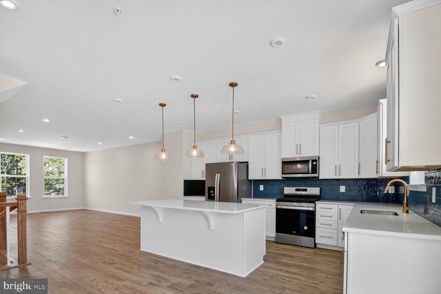 READY FOR IMMEDIATE MOVE IN!! The Chesapeake model offers spacious and flexible living across three stories, with an optional fourth-story loft and deck for even more room to grow and entertain. This thoughtfully designed townhome features 3 to 4 bedrooms, including a bright and open primary suite on the bedroom level, complete with a conveniently located laundry area. Two generously sized secondary bedrooms provide space for family and guests. The rear two-car garage opens to a recreation room or 4th bedroom. On the main living level, you'll find an impressive open-concept kitchen that seamlessly connects the great room and dining area—ideal for everyday living and effortless entertaining. As a homeowner, enjoy community amenities, including the dog park, community playground, pickleball and tennis court, and community gardens. Plus, enjoy access to Sparrows Point Country Club, which includes a marina, boat ramp, newly renovated clubhouse with restaurant & bar, an 18-hole championship-style course on Bear Creek, and the 2nd largest pool in Baltimore County. See your brand-new home today. Enjoy energy savings with our ENERGY STAR® certified and Indoor airPLUS-qualified homes. *Photos are of the Model home. *This listing reflects the base price for a to-be-built home on a lot in the community. *Pricing, features, and availability subject to change without notice.