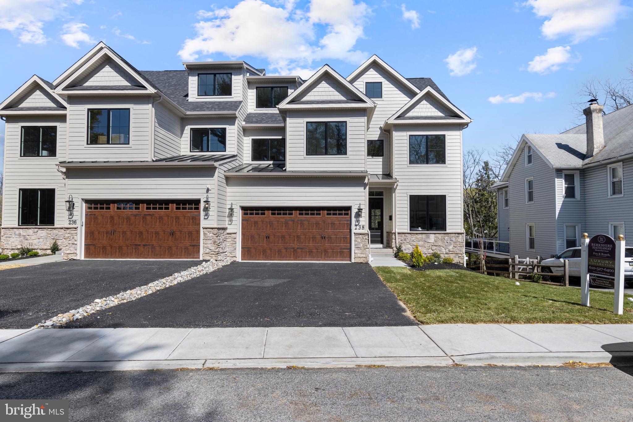 Welcome to 238 N. Aberdeen Avenue - A thoughtfully designed, brand-new attached single family home located in Walk to Wayne, within the top-ranked Radnor Township School District. Built by Eddy Homes, this home is ready for move-in February 2025!
This stunning 5-bedroom, 4.5-bathroom home showcases impeccable craftsmanship, thoughtful design, and high-end finishes throughout. From the exterior modern, yet traditional curb appeal, to the interiors with high ceilings, large windows, luxurious features, and inviting neutral colors, his home offers the best of modern living with everyday comfort.
The exterior of the home showcases James Hardi Plank siding with modern black windows with trim and a decorative 2 car garage door and glass door with front porch. This home offers 3500+ sg ft living above ground, and a finished walk out lower level with an additional 750 sq ft, for a total of over 4200 livable space.
Step inside to this inviting home with 10-foot ceilings and gleaming hardwood floors that enhance the open, airy ambiance. The main floor offers a study off the front foyer and formal powder room in the front of the home. The rear opens to an open concept sunlit great room with a gas fireplace surrounded by built-ins, a gourmet kitchen with floor to ceiling cabinetry, quartz countertops, designer backsplash, premium Thermador appliances, double oven with cooktop and a center island offering seating for 4. The sunny breakfast room offers windows overlooking the back yard as well as doors to the exterior deck, perfect for entertaining or summer outdoor dinners. A walk-in pantry is conveniently located off the kitchen and a mudroom accesses the 2 car garage.
Upstairs on the 2nd floor, the luxurious primary suite offers a serene retreat, complete with a spa-like bathroom featuring a soaking tub, frameless glass shower, double vanity, separate water closet, and divided walk-in closet. A private balcony is also off the primary suite when you want to get some fresh air. Three additional bedrooms, a shared hall bathroom with double sink vanity, and a convenient laundry room complete this floor. This home boasts 2 spaces that could be used as suites for multiple uses. The third floor could be used as a second primary suite/in-law suite. It includes a large bedroom, full bath, and a versatile bonus room ideal for a playroom, office, or guest suite.
The fully finished walkout basement adds even more living space, with a family room, an exercise room, a full bath, a storage closet and a well-lit unfinished storage area as well as the mechanical room. Sliding glass doors open to the fenced backyard — perfect for relaxation or entertaining. In addition to the 2 car garage, is the front driveway with parking for 2.
This brand new home not only offers the ease of a move-in ready, beautifully appointed home, it also offers the convenience of its prime location. Walk to all that Wayne has to offer:
0.3 mile to Wayne Train Station with service to Phila and NYC
0.3 - 0.5 mile to boutique shops, restaurants, and Fenimore Park
0.6 mile to Radnor Middle School
Whether commuting to the city or enjoying the vibrant local community, this home is perfectly positioned for both. With its low-maintenance new construction, 2-car garage, ample driveway parking, and beautifully manicured green space, you’ll have everything you need and more.