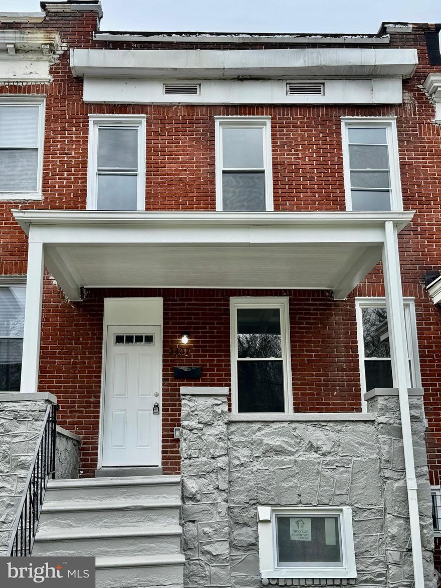 Welcome to this beautifully renovated porch-front home, ideally situated at the intersection of Woodberry, Central Park Heights, and Greenspring. 
Enjoy the convenience of being within walking distance to Druid Hill Park, The Maryland Zoo, Woodberry, and TV Hill—truly a prime location!
Step inside to find stunning coffered ceilings on the main level, complemented by an elegant electric fireplace and a brand-new gourmet kitchen featuring stainless steel appliances. The home boasts luxurious vinyl plank flooring throughout the main and lower levels, offering both style and durability.
The main level also includes a spacious pantry with a laundry hookup for added convenience. Downstairs, you’ll find a fully finished basement with a full bath and a walk-in shower—perfect for guests or extra living space.
Upstairs, the primary suite features a generous walk-in closet, while the second bedroom includes a charming sitting area. A third spacious bedroom and a beautifully updated full bathroom complete the upper level.
The home is finished off with a rear porch and a private parking pad for your convenience.
Don’t miss out on this luxurious city gem—schedule your tour today!