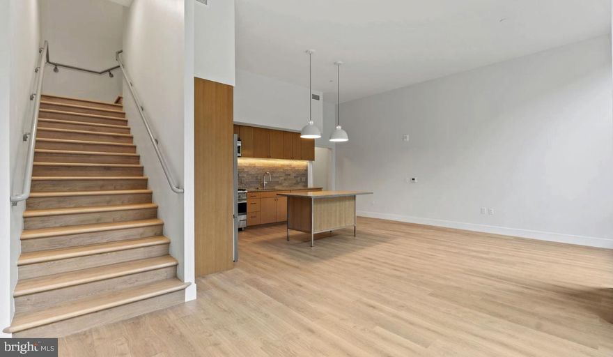 Nestled in the heart of Bethesda, Maryland, Ravel and Royale offer an unparalleled living experience that seamlessly blends luxury, nature, and culture. This duo of naturally inspired apartment communities is situated in the vibrant Strathmore Square, providing residents with a truly balanced lifestyle.

Ravel, an intimate boutique community of 49 homes, features sophisticated 2+ bedroom residences with spacious layouts and expansive balconies and terraces that invite the outside in. Royale, on the other hand, offers a diverse range of living spaces from studios to 3-bedroom apartments, catering to various lifestyle needs.

Both properties boast European finishes, generous terraces, and light-filled rooms that create an atmosphere of elegance and comfort. The thoughtfully designed interiors are complemented by an array of exceptional amenities, including a restorative dry sauna, a 24/7 fitness center, and a roof lounge offering sweeping views of the picturesque Rock Creek Park.

Residents of Ravel and Royale enjoy a lifestyle that harmoniously combines urban convenience with natural serenity. The unrivaled location, right at the Grosvenor-Strathmore Metro Station, ensures easy access to the wider Washington D.C. area while being tucked away in a tranquil neighborhood. The proximity to Rock Creek Park provides ample opportunities for outdoor recreation and relaxation, perfect for nature enthusiasts.

The Strathmore Square neighborhood is a haven for art and culture lovers. Through a unique partnership with the acclaimed Strathmore Music Center, residents receive exclusive access to diverse programming, including bi-annual sessions with a Curator Concierge, culturally-rich performances, and early offerings for premier seats. The community also hosts free evening concerts featuring Strathmore Artist in Residence alumni as part of the Music on the Square series, adding to the vibrant cultural atmosphere.

Living at Ravel and Royale means embracing a lifestyle where style, connectivity, and serenity converge. Whether you're unwinding in the restorative dry sauna, enjoying the panoramic views from the roof lounge, or exploring the nearby cultural attractions, every day offers new opportunities for enrichment and relaxation.

The surrounding neighborhood of Bethesda is known for its upscale dining, shopping, and entertainment options, further enhancing the living experience. With the perfect balance of urban amenities and natural beauty, Ravel and Royale provide an idyllic home for those seeking a sophisticated, arts-inspired living environment in one of Maryland's most desirable locations.

** Pricing and availability subject to change on a daily basis ** Photos are of model units ** Parking may be available for an additional fee **