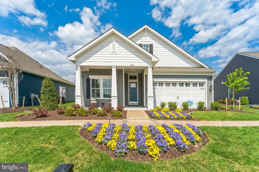 The Kerr Model Home offers a beautifully crafted layout enhanced with elevated designer finishes throughout—available now for immediate settlement with a rent-back opportunity. Thoughtfully designed with 3 bedrooms, 3 baths, and a 3-car garage, this home blends spacious living, refined styling, and everyday functionality.

Standout features include a dedicated home office, an inviting fireplace, and professionally designed details such as a feature wall, crown molding, and sliding barn doors that add custom character to each space. As an added benefit, all model home furniture is included, providing a fully move-in-ready experience.

The gourmet kitchen is equipped with a Profile range, single oven, microwave, range hood, dishwasher, side-by-side refrigerator, elegant pendant lighting, and a designer tile backsplash. Quartz countertops elevate both the kitchen and the owner’s bath for a clean, cohesive finish.

Hardwood flooring extends across the main level, with tile in all full baths and carpet in Bedroom 2 and the loft for added comfort. The owner’s bath features a shower with seat, handheld shower wand, and double sinks, creating a spa-inspired retreat designed for everyday ease.

For a full list of included features, please contact our sales representatives.

Welcome to a new luxury active adult 55+ community on Maryland's Chesapeake Bay. Discover the amenity-filled, resort-style experience within 45 miles of Washington DC and Baltimore. Residents can take advantage of the community's 24,000 sq. ft. clubhouse with indoor & outdoor pools, a state-of-the-art fitness center, and multiple tennis and pickleball courts. With a full-time lifestyle director on site the community also features a well-maintained calendar of activities such as walking club, indoor and outdoor yoga sessions, mahjong club, kayaking, pickleball and more. Kent Island life is about making friends and enjoying the company of people who have worked hard and now want to enjoy all that a luxury 55+ community has to offer. Located steps from the water and minutes from Annapolis, the location also offers quick access to Rt. 50. Enjoy the convenience of nearby dining and shopping options together with the quaint charm of a small town.