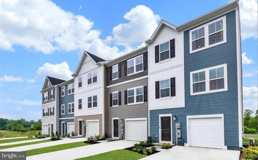 Welcome to The Gallery, one of Martinsburg's newest communities! Located centrally to plenty of recreation, dining, and shopping options, and only 2 miles proximity to major metros like I-81, you'll have everything you need within minutes of your brand-new home! Introducing the Harriett floor plan by Lennar, where luxury meets affordability. This 3-level townhome boasts a front-load 1-car garage, a spacious backyard, and 3 bedrooms. With 2 full baths and 1 half bath and an alternate third floor plan with a 2-foot extension, you'll have all the space and conveniences you desire. When you step into the home from the 1-car garage you will see the spacious rec room waiting to be transformed to meet your needs. Once on the second level, you'll see the kitchen features beautiful Caramel Fantasy granite countertops, Barnett Maple cabinets in Slate, and Frigidaire stainless steel appliances. This level has a half bath and an open concept connecting the dining room and great room. Upstairs, you will find all 3 bedrooms and 2 full bathrooms. The primary suite includes a walk-in closet. The laundry room is upstairs for added convenience. Don't miss your chance to be one of the first homeowners in this up-and-coming community! *Prices and incentives are subject to change without notice. Photos are of a similar home. Prices and features may vary and are subject to change. Prices do not include closing costs and other fees to be paid by buyer and are subject to change without notice.