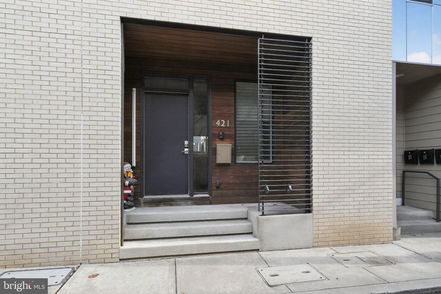 Welcome to desirable Northern Liberties and the charming Cobblestone Street of Wallace. This 4-bedroom 3.5 bath corner townhouse checks all the boxes. Enter into a spacious and open floorplan which consists of a generously sized living area and a chef's kitchen with built-in stainless-steel appliances, quartz countertops, and a large island which is great for entertaining. For all work -out Phanatic's the basement is completely finished and makes a very nice personal gym and is even large enough to include your home office.  Bedrooms are all very nicely sized with great closet space, the master bedroom is located on the 3rd floor and offers a grand closet and gorgeous tiled bath.  One more flight of stairs will take you to the 4th bedroom and the gorgeous outdoor deck to relax in the evenings and enjoy the views. Best of all this residence offers one assigned parking space directly off the patio area in the Community's private lot.  This property still has app 18 months remaining on the tax abatement. Don't miss out on this one and all the great restaurants and coffee shops that Northern Liberties has to offer.