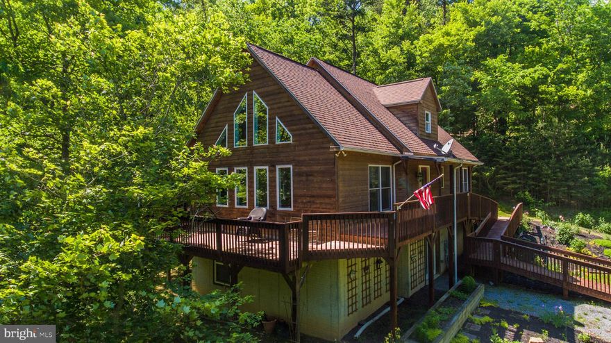 Sleepy Creek Waterfront  Situated at the end of a culdesac, with 380' frontage on the Sleepy Creek.  Perfect oasis for full or vacation getaway.  Main level features Great room with Gas FP and dining area, kitchen, MBR/BA & laundry.  Upper level has 2 BR, 1 BA.  Basement has drywall and epoxy floors, just waiting on your finishing touches.  Screened in deck, wraparounds to deck with ramp to parking area.  2 car detached carport.  Small subdivision with low HOA fees located in southern Morgan County.