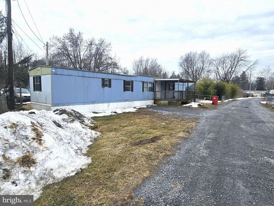 EXCELLENT INVESTMENT OPPORTUNITY! Mobile home on an owned .1+/- acre lot! The home features 3 bedrooms, 1 bathroom, a comfortable living room, and a kitchen. Several important upgrades have been completed, including an upgraded 200-amp electrical service, a new water heater installed in 2024, and a new bathtub and toilet in 2022. The home was fully replumbed in 2024 with PEX piping to help prevent frozen pipe issues, with all water lines located within the conditioned space of the home except for the main supply line. This property will be offered at online-only auction on Tuesday, March 17, 2026, at 3:00 PM.