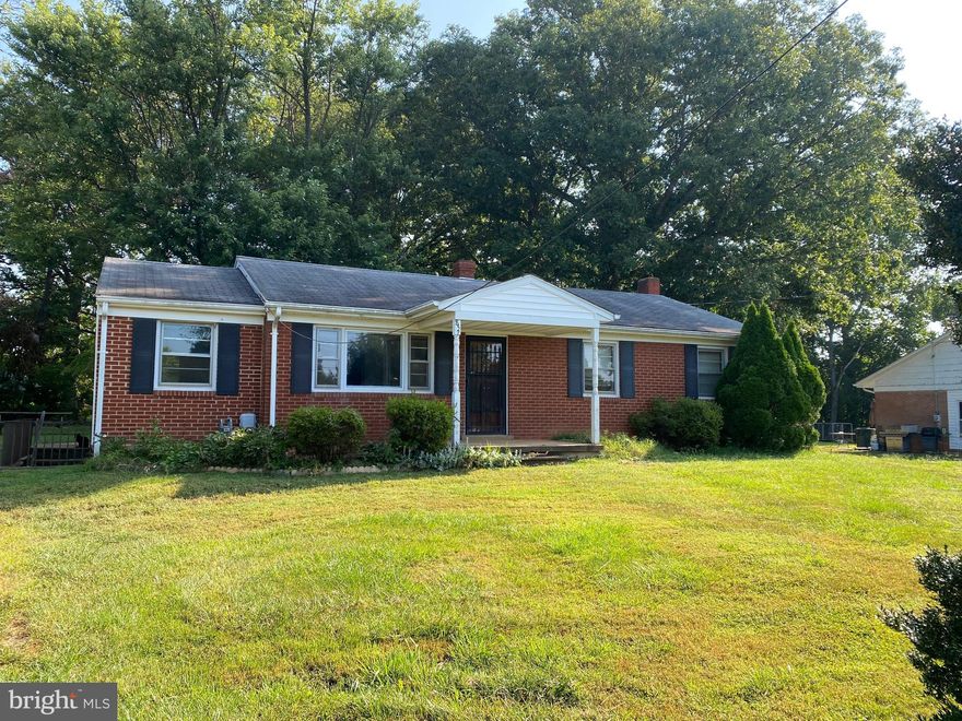 Back on the Market - Need a project with good potential ..... this is it! A three bedroom; one Bath brick house on a LARGE (.55 acre) lot in Town of Culpeper. Needs a little TLC but the end result could be really nice.   Good sized kitchen with eat in space. Multi-purpose room/office/TV at the side entrance. Hardwood floors from the  living room back to the bedrooms. The bathroom has space to update from it's 1970 origin.  Surrounded by other brick homes and easy access to Sperryville Pike.The house is on a private well but on a flat rate public sewer and trash fee with the Town of Culpeper. Sold strictly "as is" - the seller will not make any repairs nor concessions.