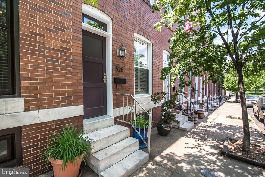 Adorable 2 bed, 1 bath home w/PARKING that can fit an SUV in Canton.  Lovely hardwood floors stretch through the main level. Awesome open kitchen with breakfast bar, long granite counters & SSL appliances. Upstairs are the bedrooms w/beautifully renovated bath with marble tile.