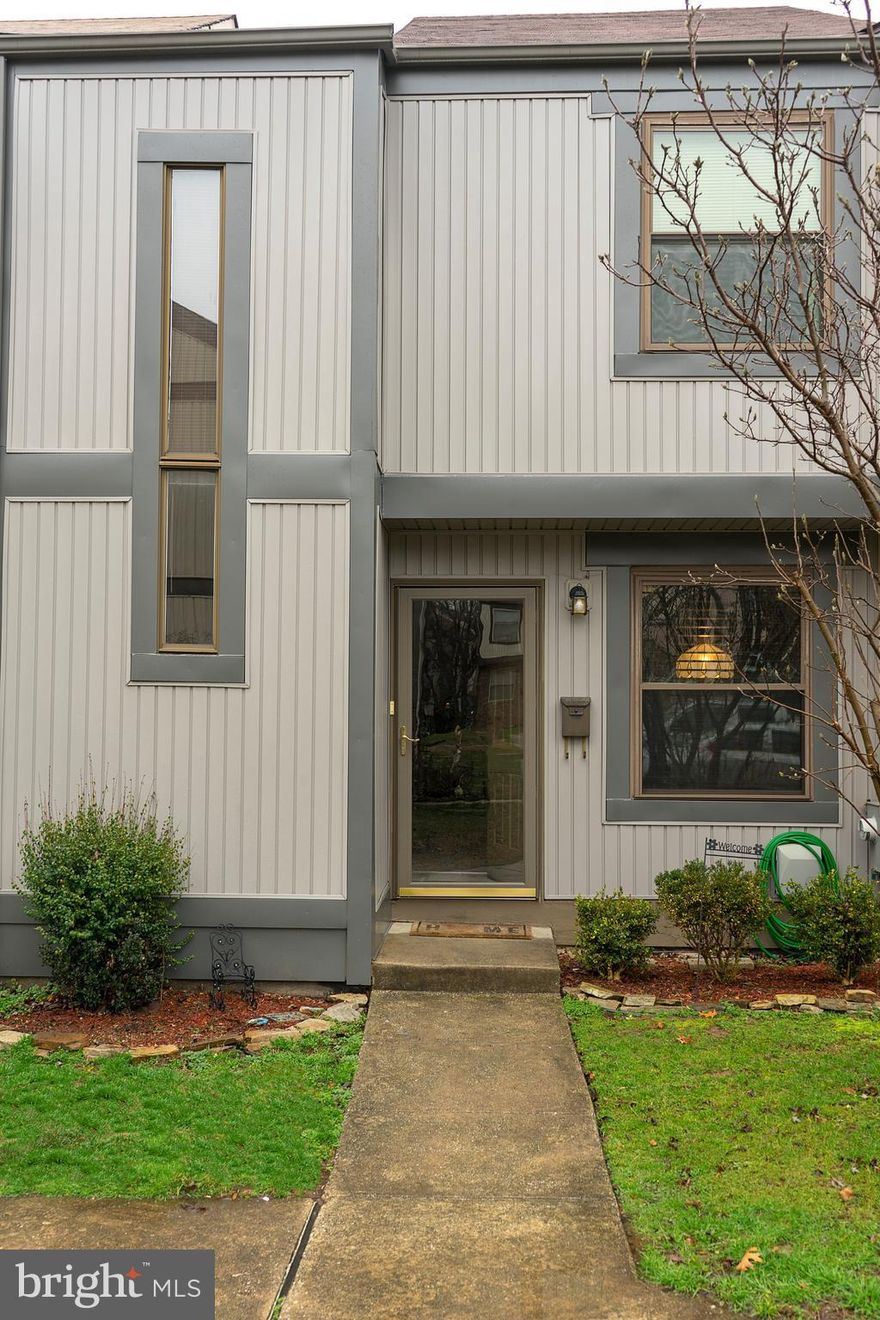 Great home with fresh paint and new carpet. Move in ready. Enjoy the view of Hopkins Creek and be prepared to launch your boat from your own pier.!! Pier has water and electric service. Home comes w 2 parking spaces.