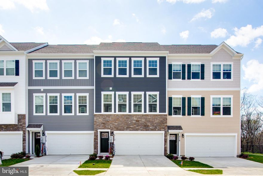 Beautifully well maintained Townhouse in Parkside Community! Nice interior unit with 2 car garage. Hardwood floor throughout main level. Extra 4th bedroom with full bathroom in basement. Gourmet kitchen with white cabinetry & hub for mini workstation, stainless steel appliances, and spacious Quartz island with built in sink. . 4 beds with 3.5 full bathroom. All levels brightly filled with daylight. Master bedroom includes ceramic title, glass shower, and dual vanities. Laundry room located on bedroom level. The community is just minutes away from all the exciting action of new restaurant and shopping. Unbeatable access to Arundel Mills within 4 miles of Ft. Meade/NSA and major commuter routes.