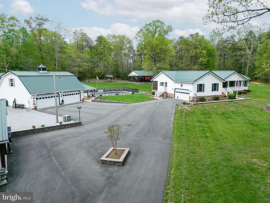 SEE AGENT REMARKS!  Welcome home to your dream property! Inside you will find an open floor plan, kitchen overlooking the spacious family room, dining area, 3 bedrooms, 2.5 baths, and a screened in back porch. Each bedroom is nice size, and the primary suite boasts a private bath and walk-in-closet. Situated on almost 10.5 acres this home offers plenty of space for outdoor activities, gardening, and more. Multiple outbuildings provide endless opportunities for storage, hobbies, and/or additional parking. 3 separate pavilions (2 with electric) perfect for gatherings and entertaining. There's a fully fenced in ground pool....ready for you to enjoy this summer. In addition to the attached 2 car garage, you'll also find  a detached 70x40 garage that holds approx 8 cars, has a half bath, and a finished area above perfect for a rec area or office space. That's not all...you'll also find a 16x16 shed with power and 2 eight foot overhangs, and a detached car port. The house and all outbuildings are updated with a metal roof. Whether you're into cars, entertaining guests, or just enjoy relaxing in the peace & quiet of your own home, this property is for you!