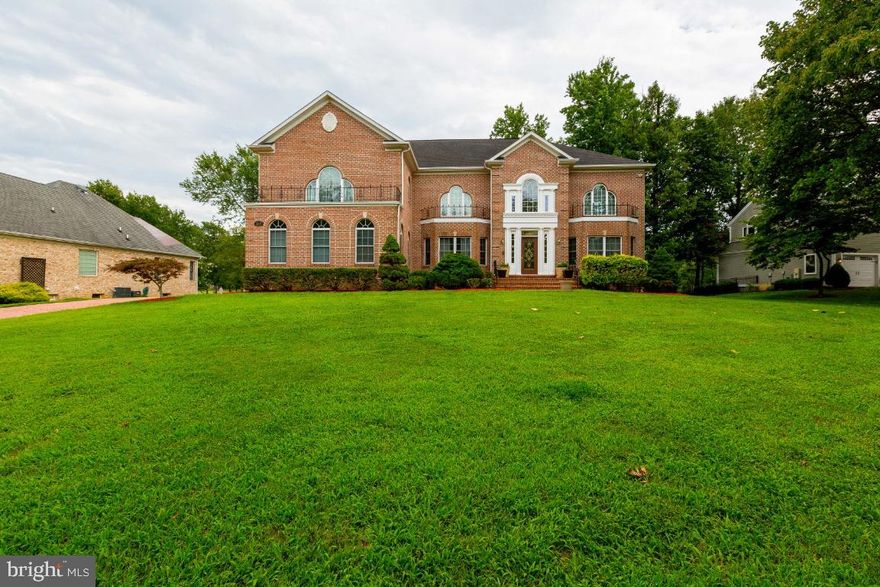 Wonderful, spacious & elegantly designed custom-built all-brick home located on the National Golf Club  18-Hole Golf Course In Tantallon on the Potomac where every home in the neighborhood is custom-built.  Located on a quarter acre of land on the ‘cul de sac’ of Monterey Circle and just steps away from the golf course’s 11th hole with views of the golf course & pond. This beautiful 5-bedroom, 5-bath, 3-car garage and 3-level home has a fireplace on each level and hardwood floors on the main level. When you first enter this home, you immediately notice the high ceilings throughout the first level and get an appreciation of how spacious this home is.   The main level contains a large entry hallway, family room, sitting room, living room with a fireplace, private office, large half-bathroom, sun room, laundry room, pantry room and large Chef Kitchen with an Island Stove.  From the first level, you can access the upper level from either side of the home via the double stairwell.  The upper level contains the master bedroom suite with a large Sitting and fireplace; master bedroom has large jacuzzi, enclosed shower and spacious dual sink; a second bedroom has an en suite.  Two large bedrooms, large full bathroom and  bonus office room.  Intercom System in each bedroom and outside front door.  The lower level contains a large open concept basement, bedroom, bonus room, a full bathroom and a large storage room with walkout sliding door to the backyard and golf course.  The curbside appeal of this crown jewel is amazing and you should make this your next home.