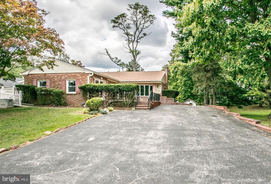 516 Beatty Woods combines a prime Springfield location with a layout ready for your updates and vision. This solid rancher offers 4 bedrooms with hardwood floors, 2 full baths, and 1 half bath. Natural light pours in, highlighted by a bay window in the living room with fireplace. The main level also includes a formal dining room, family room, and bright four-seasons room. The eat-in kitchen features 2 skylights, stainless steel appliances, Corian countertops, tile backsplash, and abundant cabinet space. A main-level laundry with washer and dryer adds convenience. The walk-out lower level provides additional space with natural light, storage, and options for hobbies, a workshop, or future finishing. A whole-house generator and 2 exterior ramps add ease of access. This home also offers peace of mind with a roof replaced within the last 4 years, a new water heater (2024), and a new heater (2023).  Close to 476/Blue Route, I-95, Media Train Station, Philadelphia Airport, and Downtown Media.