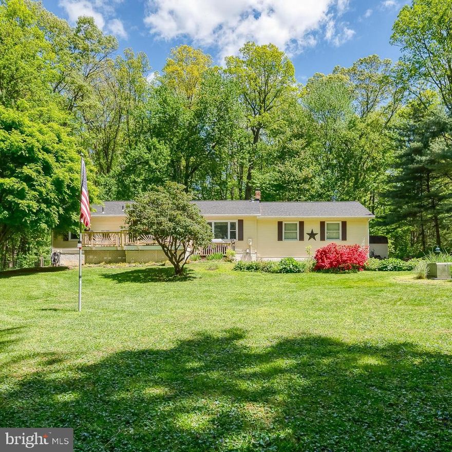 Welcome to 3919 Emrick Lane in the charming community of Jarrettsville, MD. Nestled on two private acres, this property offers a peaceful, tucked-away setting with room to spread out and enjoy.

Inside, you’ll find 3 bedrooms and 2 full baths, along with a spacious kitchen featuring stainless steel appliances and a double oven. The open dining and living areas create an inviting space for everyday living, centered around a cozy pellet stove. Durable luxury vinyl plank flooring runs throughout most of the main level.

The finished basement provides additional living space, complete with a wood stove (as is), electric fireplace, expansive bar, and pool table. There’s also a large utility area with laundry and convenient walk-up access to the side yard.

Outdoor living is just as impressive. A large front deck overlooks a small fish pond, and yes, the fish convey. The backyard features another deck, a fenced area, two sizable storage sheds, and a chicken coop with chickens included.

The roof was replaced in March 2026. Additional highlights include a spacious garage, generator hookup, and ample parking, all set against a peaceful, natural backdrop with frequent wildlife sightings

Located on a no-thru street, this home offers a strong sense of privacy while still being just 20 minutes from Bel Air. It’s a great blend of rural charm, everyday convenience, and a friendly community to call home.