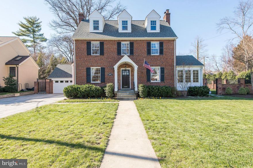 Stunning red brick center hall colonial on premium corner lot in Chevy Chase Village. Completely updated and turn key. 5 bedrooms, 3.5 baths, chef's kitchen, dining room for 12, generous living room w/fp, lovely lower level family room with fp, home office, light filled sun room. Custom garage, "Pinterest" worthy laundry room, central vac system, storage galore. A perfect 10!