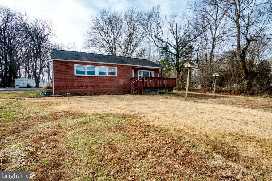 ONE LEVEL LIVING! This renovated move in rambler is situated on 2 acres of flat land with plenty of space to enjoy the great outdoors. A natures lover s dream with views of Mattawomen Creek. Kitchen complete with Corian counters, Stainless appliances and a breakfast bar. Beautiful refinished hardwood flooring throughout. Updated tiled bath. Plenty of parking. Perfect for the First-Time Homebuyer. Why rent when you can own for less. USDA 100% financing available for qualified buyer. Hurry don't miss out!