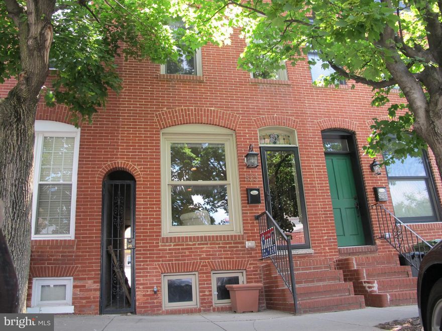 3 years remaining on CHAP tax credit!!  Amazing Canton renovation with all the bells & whistles!  Hardwoods throughout, gourmet kitchen with stainless appliances, granite countertops, & breakfast bar.  Exposed brick in living room & master bedroom.  Master bath with whirlpool tub.  Large rooftop deck with incredible views of the city.  Prime location just steps from the water & Can Company.