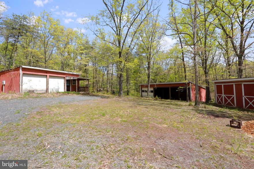 Beautiful, almost completely flat buildable lot.  Sits on over 5 acres! Zoned RA (Rural Area). RA is the least restrictive zoning Frederick County has to offer.  There are currently 3 buildings on the property already equipped with electricity.  Perc test and survey have been done - see uploaded docs.  Amish built shed is not included but can be negotiated with the sale.