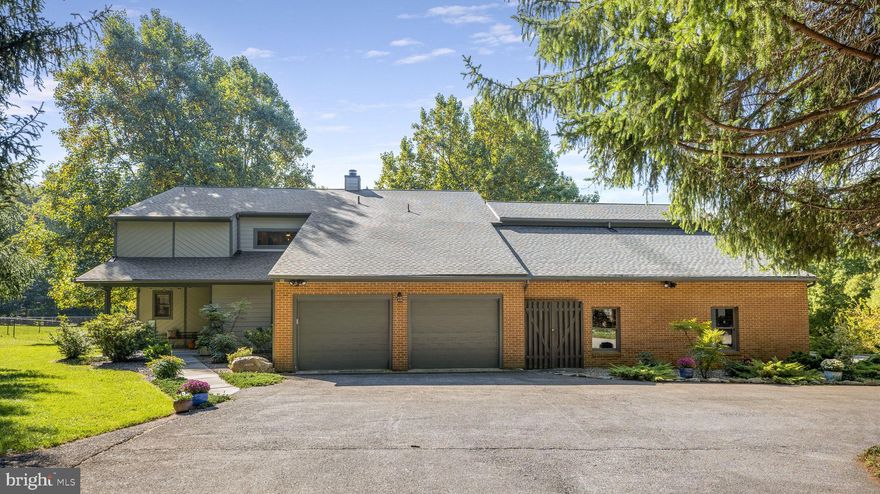 Welcome to your one-of-a-kind retreat, nestled in an ideal location just 5 minutes away from shopping, restaurants, and the Shady Grove Metro. This exceptional property offers the perfect blend of convenience and tranquility, giving you the feel of a country abode in the heart of the city. As you approach this remarkable home, you'll be greeted by a sense of exclusivity. Situated on a sprawling 4-acre lot at the end of a long, private circular driveway, this residence promises a lifestyle like no other. Upon entering, you'll find a convenient mudroom that sets the tone for a well-thought-out design. The grandeur of this home truly comes to life in the 2-story foyer, leading to the impressive 2-story great room. Here, a massive brick fireplace takes center stage, complemented by vaulted ceilings and skylights that bathe the space in natural light. Expansive windows on the rear side of the house seamlessly connect the living room, great room and dining area with the picturesque outdoors. The kitchen, updated in 2021, boasts cherry cabinets, quartz counters, and updated stainless steel appliances. It's a culinary haven that promises both functionality and style. You'll also discover an exercise room, utility room, and a convenient half bath on the entry level, catering to your every need. Venture to the upper level, where you'll find 4 spacious bedrooms, each with its own private ensuite bath. The primary bedroom is nothing short of enviable. It features a sitting room/office, a cozy fireplace, a massive walk-in closet, a cedar closet, a private balcony, and a cedar-walled ensuite bath that pampers you with both soaking and jetted tubs. For your entertainment and relaxation, the partially finished basement offers a recreation room complete with a wet bar and plenty of room for storage, ensuring endless possibilities for customization.  Step outside, and you'll discover a world of outdoor bliss. A large screened-in porch with decks on either side beckons you to enjoy the serene surroundings. With a 4-car attached garage space and a detached shed/garage perfect for additional cars, machinery, or even a boat, your storage needs are well-catered to.  The property itself is a private oasis, surrounded by a canopy of trees and graced by a backyard shed and winding walking trails. You could wander these trails for hours, immersing yourself in the natural beauty that surrounds you. In summary, this unique property offers the perfect fusion of modern convenience, timeless elegance, and natural splendor. Don't miss the opportunity to make this exceptional retreat your own – schedule a viewing today and experience the lifestyle you've been dreaming of.