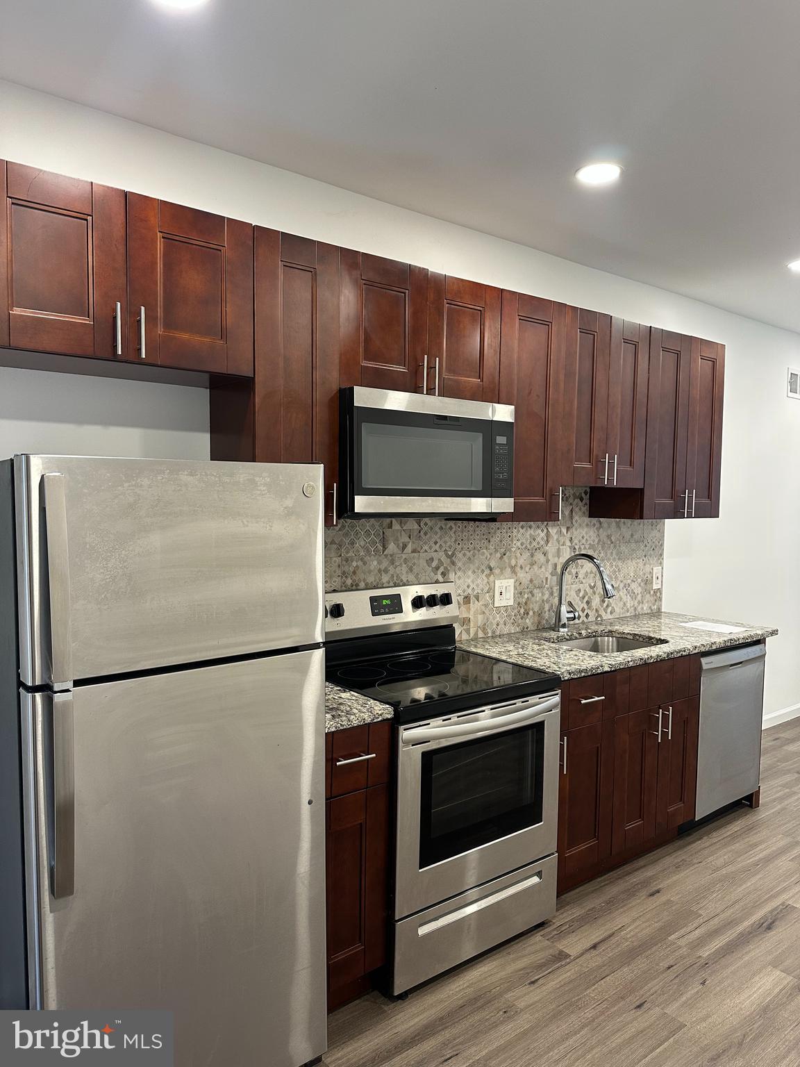 The seller is willing to provide a $10,000 seller assist to cover any closing cost expenses.
This lovely recently fully rehabbed house with in-law suit for additional income is located minutes away from Center City. Features custom designed kitchen, granite countertop, central A/C, dishwasher and all brand new stainless steel appliances with laundry hook-up. Second floor unit is occupied by tenant. First floor unit is bi-level with access to a backyard and currently vacant. Collect rent and live for free, don't worry about repairs as everything is brand new.