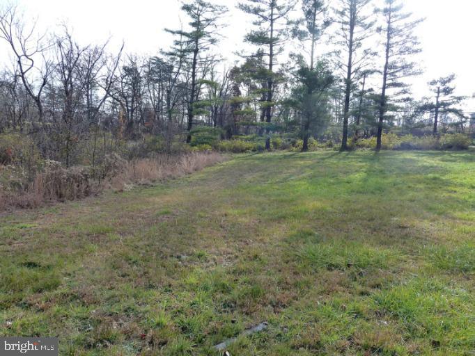 GPS : go to 2122 Pine Ave - Windsor Mill - Build your dream home on this beautiful 0.8940 lot in Pine Ave! Located in the 2100 Block of Pine Ave this lot has trees along the perimeter for privacy and backs to a wooded area. No covenant restrictions. This is a prime land opportunity in Baltimore County presenting a fantastic parcel of land offering a unique opportunity to build your dream home or investment. Please note it is the responsibility of the buyer to conduct their own due diligence regarding the lot. The seller will not perform any test or inspection and must conduct to ensure that this lot is exactly what you want. This is your chance to secure a great piece of land in the area. The lot is sold AS IS, land use is R Residential and the legal description is LT NS PINE AV 660 N WINDSOR MILL RD. Water and Sewer hook up available .Pending release - contract fell thru