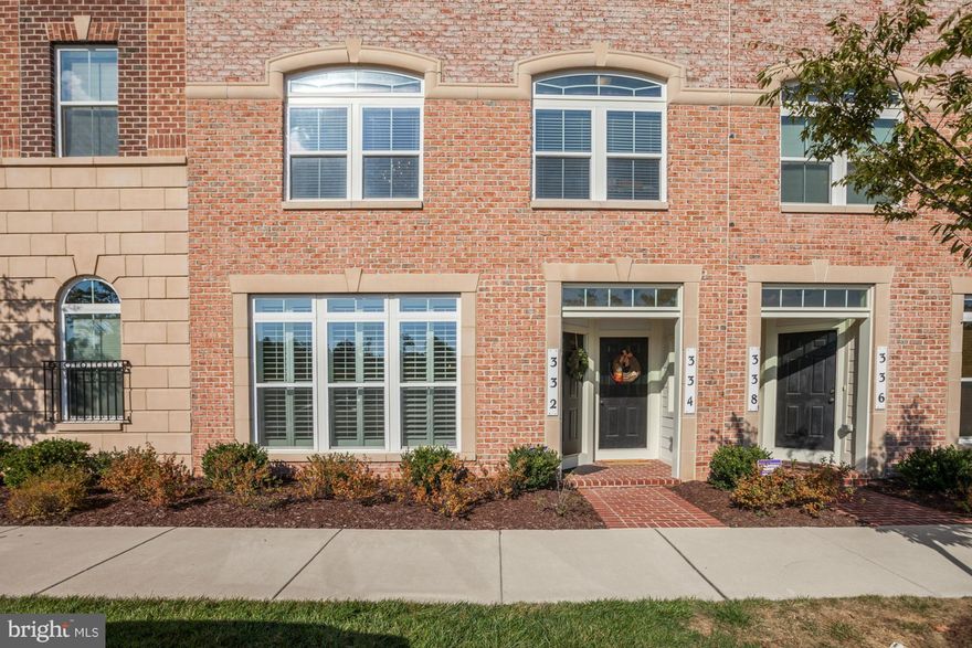 NEW PRICE!!!! Gorgeous and spacious interior 3BR/2BA townhome in desirable Watkins Mill Town Center. Better than the model home condition. Custom HW floors. Custom kitchen cabinets/granite and S/S appliances. Huge MBR/WIC + MBA. Second floor in-unit washer/dryer. Garage has been transformed into a home theatre w/ custom 3" concrete shelves easily transform back to garage. Commuter location!