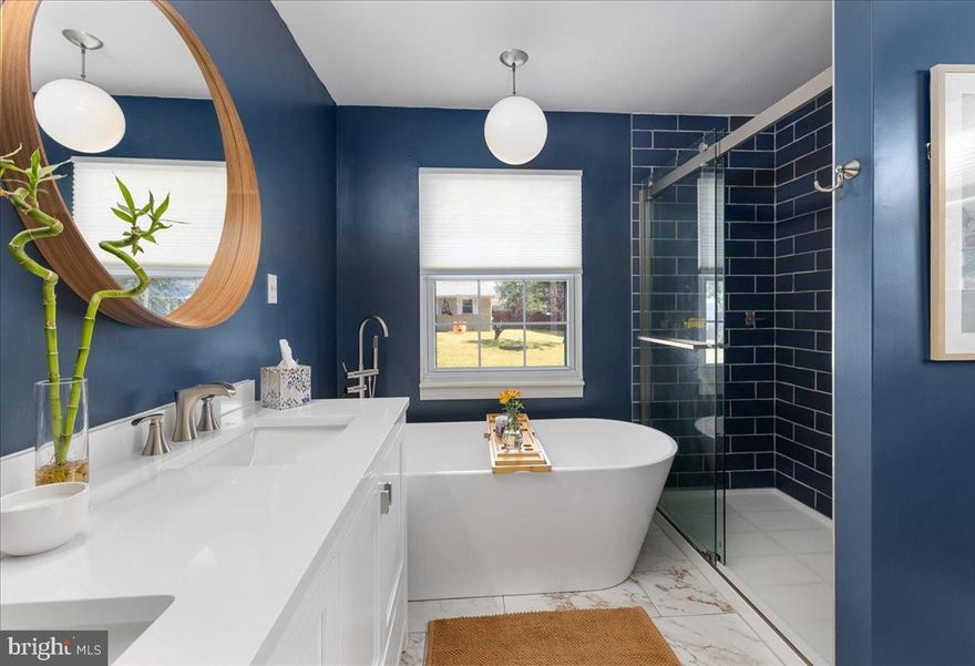 Impeccably upgraded, this 3 bedroom, 2 bathroom residence is nestled in the tranquil neighborhood of Boulevard Park on the Magothy. Offering water privileged living, this home is positioned within the sought after Chesapeake School District. The primary bedroom boasts a lavish en-suite bathroom, complete with a soothing soaking tub. The kitchen showcases beautiful Dekton countertops and high-end stainless steel appliances, including a gas range. Outdoors, you'll find a spacious backyard and new deck, perfect for both relaxation and entertaining. The basement adds versatility with a spacious multipurpose room.  Contact me today to arrange a private viewing and secure your new haven in Boulevard Park.