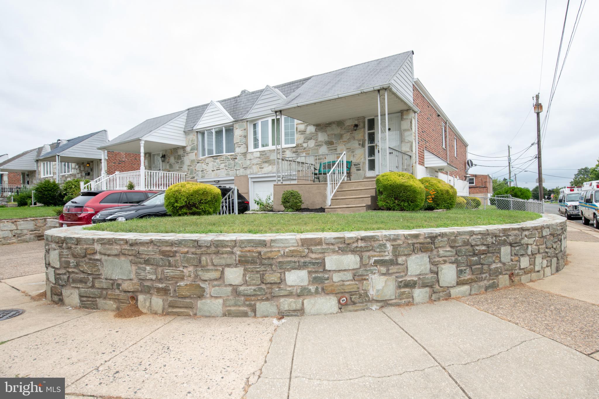 Location, Location, Location! Welcome to this immaculate stone and brick twin home in the highly desirable Bustleton neighborhood—just steps from the award-winning Anne Frank Elementary School.
This single-story home offers the comfort and ease of one-level living. The open-concept living room and dining area is filled with natural light, complemented by gleaming hardwood floors. The main kitchen features beautiful solid maple cabinets, gas cooking, and a ceramic tile floor, with a layout that makes cooking and entertaining a breeze. To complete this level the primary suite includes its own private bath, two additional bedrooms and a full hallway bathroom. The finished lower level expands your living space with an additional large living area, with a gas fireplace, a second kitchen, abundant closets for storage, a laundry area, powder room and inside garage access. Sliding glass doors open directly to the large fenced backyard, perfect for relaxing, gardening, or entertaining. This move-in ready home combines modern convenience with a prime location—don’t miss the chance to make it yours! This home just sparkles!!