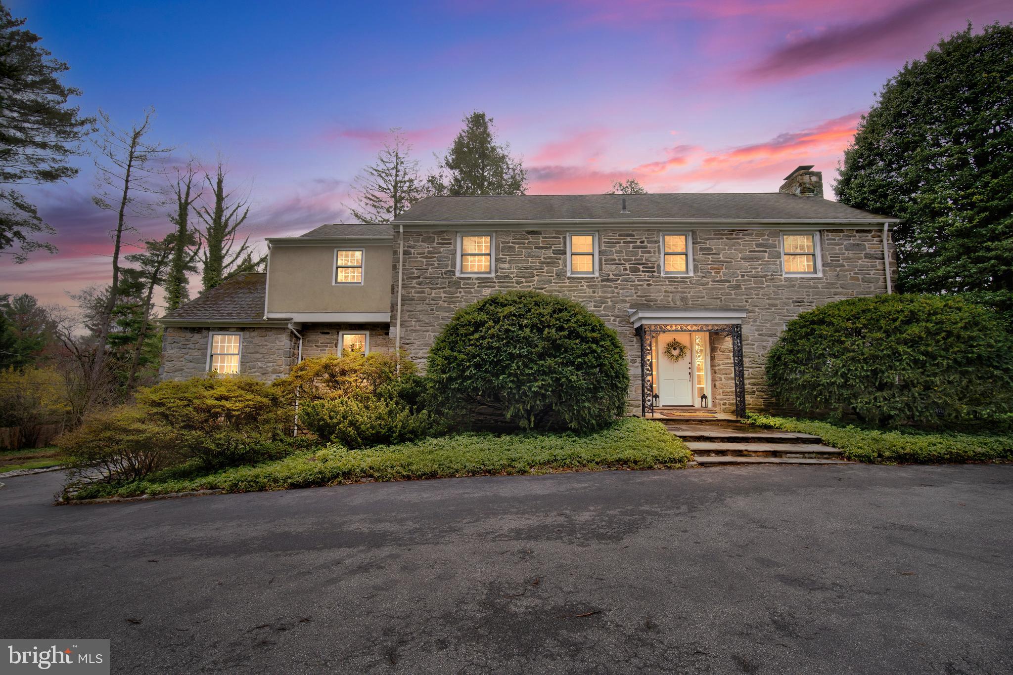 As you enter the driveway heading to  525 Fishers Road, you will be welcomed by  the lush landscaping and beautiful stone exterior.  This Charming home is located in the desired North Side of Bryn Mawr, and is ready for its new owners with both formal and casual areas for entertaining or relaxing with  friends and family.   The first floor has two living areas, a lovely sitting room,  Large Dining area with tons of natural light, and two convenient powder rooms.  Entertain or relax on the beautiful stone terrace just outside of the living room when the weather is nice.  The custom kitchen has everything the chef in your family would need to prepare gourmet meals, and there is also laundry on this main level as well.  Upstairs you find the three bedrooms, two spacious en-suites on either end of the property with a third bedroom located just across from the hall bathroom.  The primary suite is located just past the hall bath and encompasses a large portion of the upstairs living area.  Beautiful vaulted ceilings and lots of storage in the custom walk in closet!  You have a Large en-suite bathroom with soaker tub and shower stall to go along with the double vanities.  Down the hall is the second bedroom which includes a large en-suite bathroom with with shower stall.  The middle bedroom has built ins and large closet space as well.  Hardwood flooring runs throughout the home as well as a lot of little design touches that have to be seen!  Located in the highly sought after town of Bryn Mawr, on the distinguished Main Line, this home sits within a few miles of a number of acclaimed  golf courses, award-winning restaurants, and major shopping areas.  Situated  in the Lower Merion School District, with many prestigious private schools in the area as well.  This home is ready as it stands for you to move right in but also has plenty of room for your design vision to come to life,  so bring your Builder, family or come alone...this property is truly a must see!