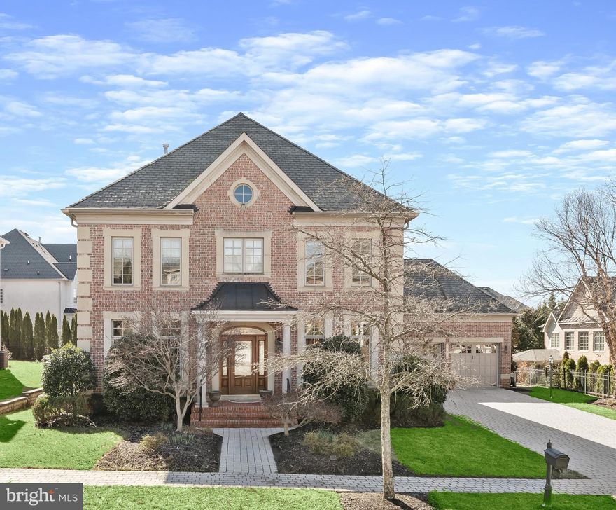 Just Listed & Open By Appointment!! Prominently sited on over a quarter acre lot in the Oaks in North Bethesda, this special Colonial home combines exquisite finishes and an enviable floor plan to create a unique offering in an unbeatable location of a wonderful private enclave of homes. High ceilings, custom woodwork, expansive entertaining spaces, generous bedroom suites with spa-like baths are on display throughout the 6,650 square foot home’s 5 bedrooms, 5 full bathrooms and 2 half bathrooms. Enjoyment of the outdoors is enhanced from a screened porch with vaulted ceiling and skylights. The property showcases mature landscaping with professional lighting, desirable rear decks, one with a built-in grill, and a picturesque patio to create an idyllic setting for al fresco dining and entertaining. This showpiece offers the perfect pairing of functional yet vast living spaces for a seamless and comfortable lifestyle.   
Soaring 10’ ceilings, gleaming hardwood floors span the Main Level’s open concept living spaces. A Study, complete with beautiful built-ins, and the formal Dining Room flank the home’s entryway. Designed to be the heart of the home is the generous Gourmet Kitchen with stainless steel appliances, eating space and a large center island which opens to the expansive Family Room, providing the perfect gathering space with utmost ease in mind. Beamed ceilings, custom entertainment built-ins and a gas fireplace with floor-to-ceiling stone create an air of coziness and comfort for intimate gatherings or larger scale entertaining. The home’s rear deck and patio, boasting extensive hardscape and a built-in BBQ grill, and Screened Porch complete with skylights, are directly accessible from the Family Room for effortless entertaining. One of two luxurious Primary Suites is located on the Main Level and features two large walk-in closets, and an ensuite bathroom with dual vanities, a soaking tub and large walk-in shower. Completing the Main Level is a Powder Room with custom glass bowl, Laundry Area and an attached, extra large, 2-Car Garage with built-ins for extra storage. 
A highlight of the Upper Level is the expansive second Primary Bedroom Suite, outfitted with lighted tray ceiling, a charming Sitting Room with columned entry, a generous fully organized walk-in closet and a spa-like bath. Two additional Bedrooms are located on the Upper Level. Both Bedrooms have ensuite Bathrooms. One Bedroom features an attached office with a built-in desk, credenza and audio center.  
The Lower Level is where multifunctionality and luxury living meet. Offering an expansive Recreation Room, Golf Room, Exercise Room and fifth ensuite Bedroom and large storage area, the Lower Level provides space for a variety of activities with flexible living and entertaining spaces.
This home is ideally located. Easy access to 495, 270 and Grosvenor Metro, Wildwood Shopping Center,  Pike and Rose, Cabin John Park and many shopping options are in close proximity.