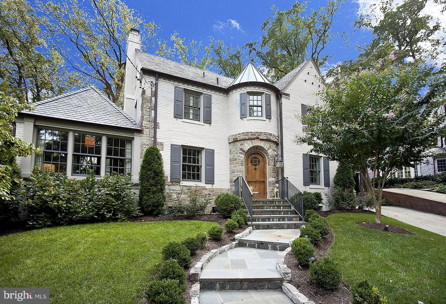 GREAT NEW LISTING! Located on one of Wesley Height's premier streets, this 1932 Tudor was completely renov in 2009.Optimum flow w/  main level w/LR, formal DR, Sun Rm, expansive chef's kitch. w/break area & attchd FR overlooking flagstone terrace/rear yard & 2 car attchd garage. Up Lvls feat lux Mstr Ste w/ 2 WIC & marble BA, 3 addt'l BR's, 2BA's & play room. LL incl. Family Room & Au-Pair Suite.