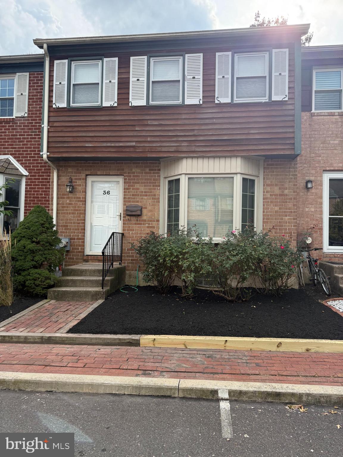 Charming 3 bedroom townhome. A beautifully situated townhouse nestled in the desirable Olde Colonial Greene community. With 3 bedrooms and 2.5 bathrooms, and approximately 1480 sqft of above ground living space, this home perfectly balances comfort, character, and convenience. The first floor is bright and spacious, featuring a dual sided fireplace separating the living and dining areas, creating warmth and elegance. The kitchen offers ample wood cabinetry and tile backsplash and a functional layout. The upstairs comprises a master suite with a full bath plus two additional well sized bedrooms sharing a tiled full hallway bathroom. The basement is partially finished and includes a dedicated laundry area and workshop. There is a deck access off the dining area-perfect for outdoor dining and relaxing in the evening. Low maintenance landscaping and HOA support for common area upkeep. This beautiful townhouse is just minutes from Doylestown borough, shops, restaurants, parks and access to major commuting routes.