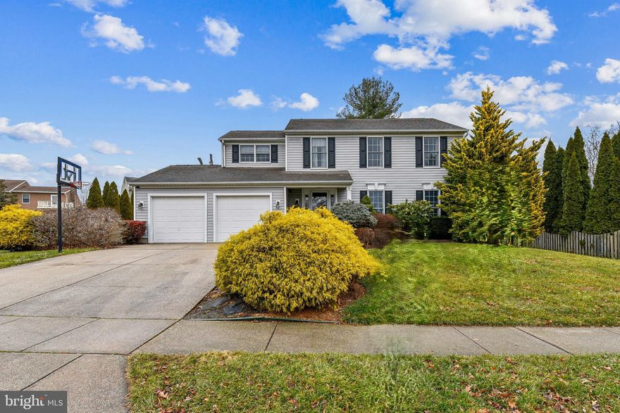 Welcome home to this beautiful 4BR Colonial in the sought-after Majors Choice community. Sunlight pours through cathedral ceilings and skylights, highlighting hardwood floors and two cozy fireplaces that make every space feel warm and inviting. The heart of the home opens to an expansive 500 sq ft deck, perfect for hosting gatherings or enjoying quiet evenings overlooking the fully fenced backyard.

The finished basement offers a versatile recreation room and half bath—ideal for movie nights, play space, or a game room. Retreat to the spacious primary suite featuring a walk-in closet and a peaceful, private feel. This home blends comfort and convenience seamlessly.  Meticulously maintained and truly move-in ready.