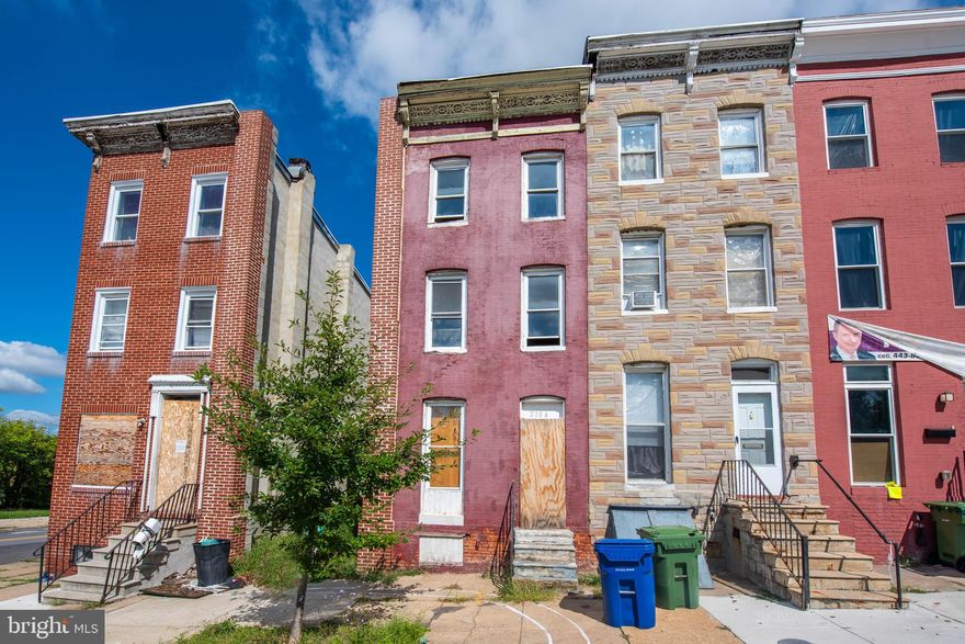 REHAB OPPORTUNITY! 3 LEVEL ROWHOME THAT'S READY FOR YOUR RENOVATIONS.  Located across from Collington Square Park and close to Johns Hopkins.  Sold As-Is